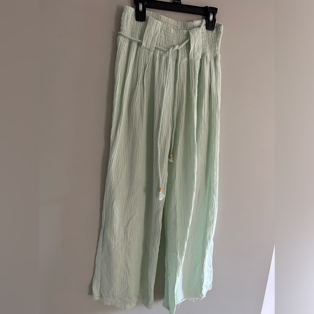 Light teal pants for women. Size small.